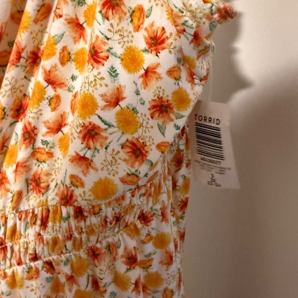 Floral Print Smocked Peplum Top - Picture 8 of 9